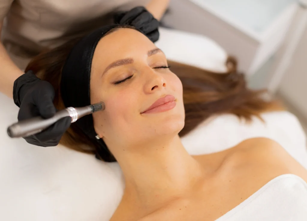 A woman relaxing during professional skin rejuvenation treatments in Brevard County with microneedling