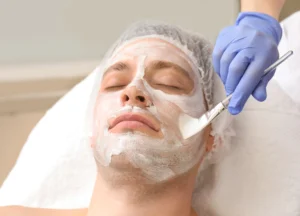 Middle-aged man receiving advanced skin care treatment for men’s wellness in Brevard County holistic med spa