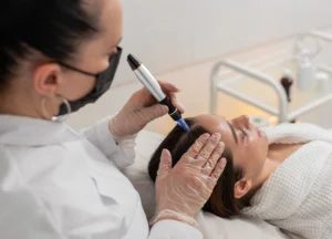 Client getting expert hair and scalp therapy to promote healthy growth and scalp wellness