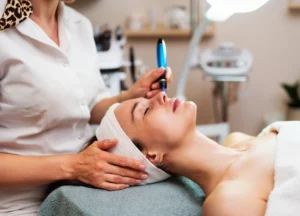 Woman enjoying professional skin rejuvenation at ReVive Skin & Scalp for glowing, healthy skin